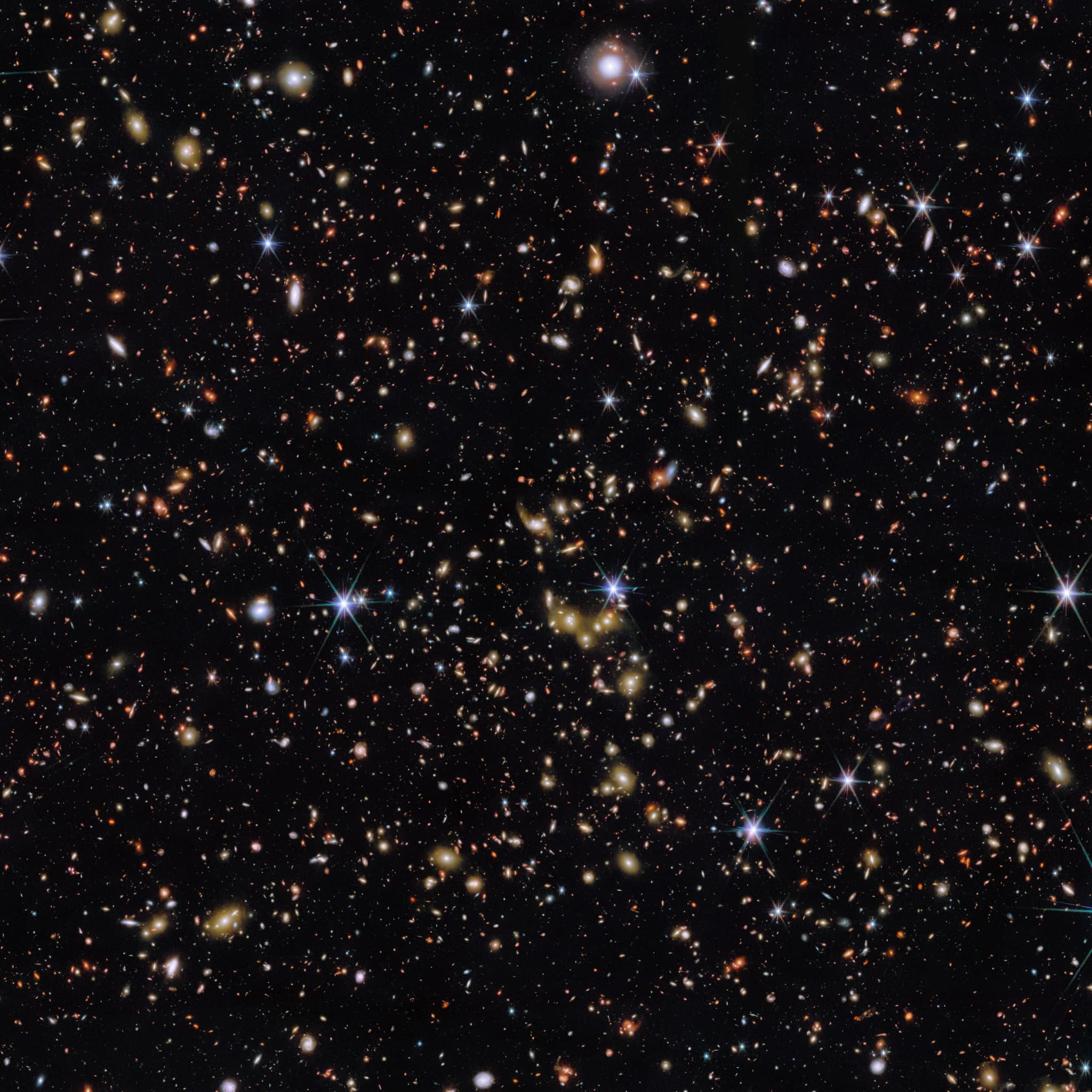 Webb COSMOS-Web deep field crowded with galaxies of every shape.