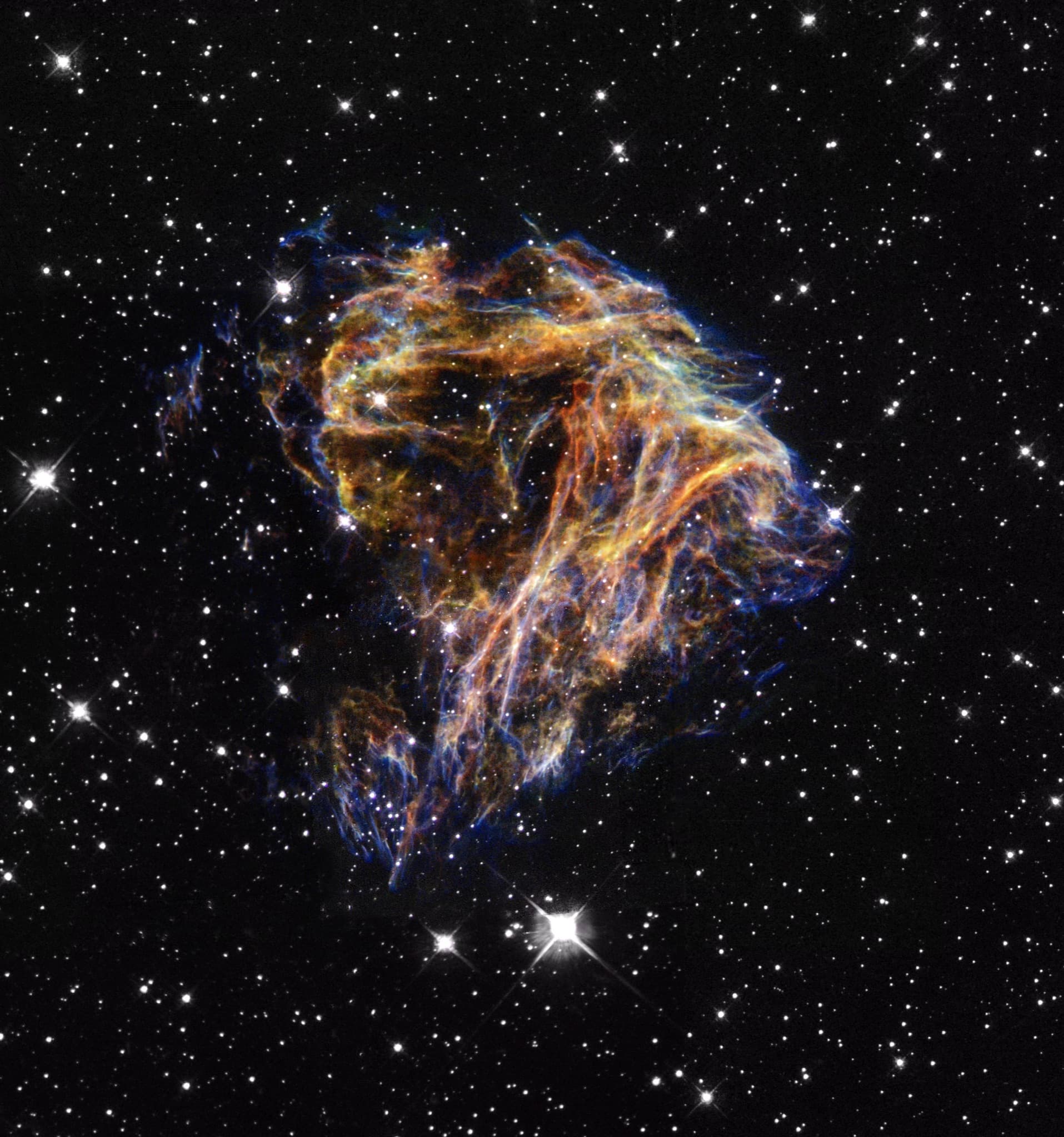 Hubble image of N 49, the wispy remains of a supernova in the Large Magellanic Cloud.