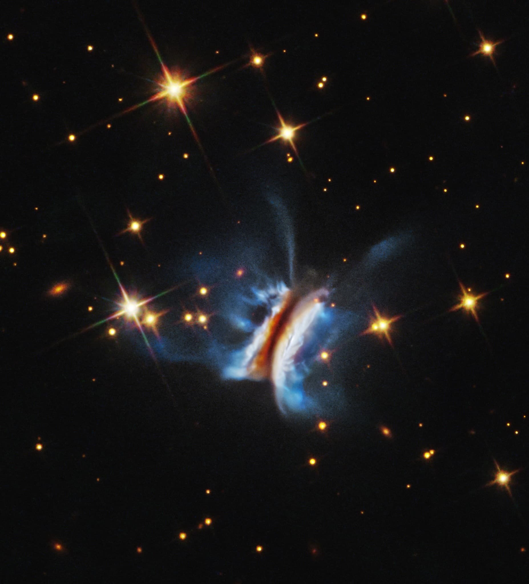 Hubble image of a large chaotic protoplanetary disc, a birthplace of planets.